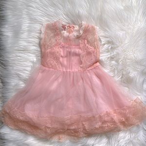 Sweetest peachy pink dress for a tot